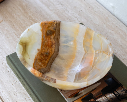 Artisan-carved olive onyx bowl with polished stone finish