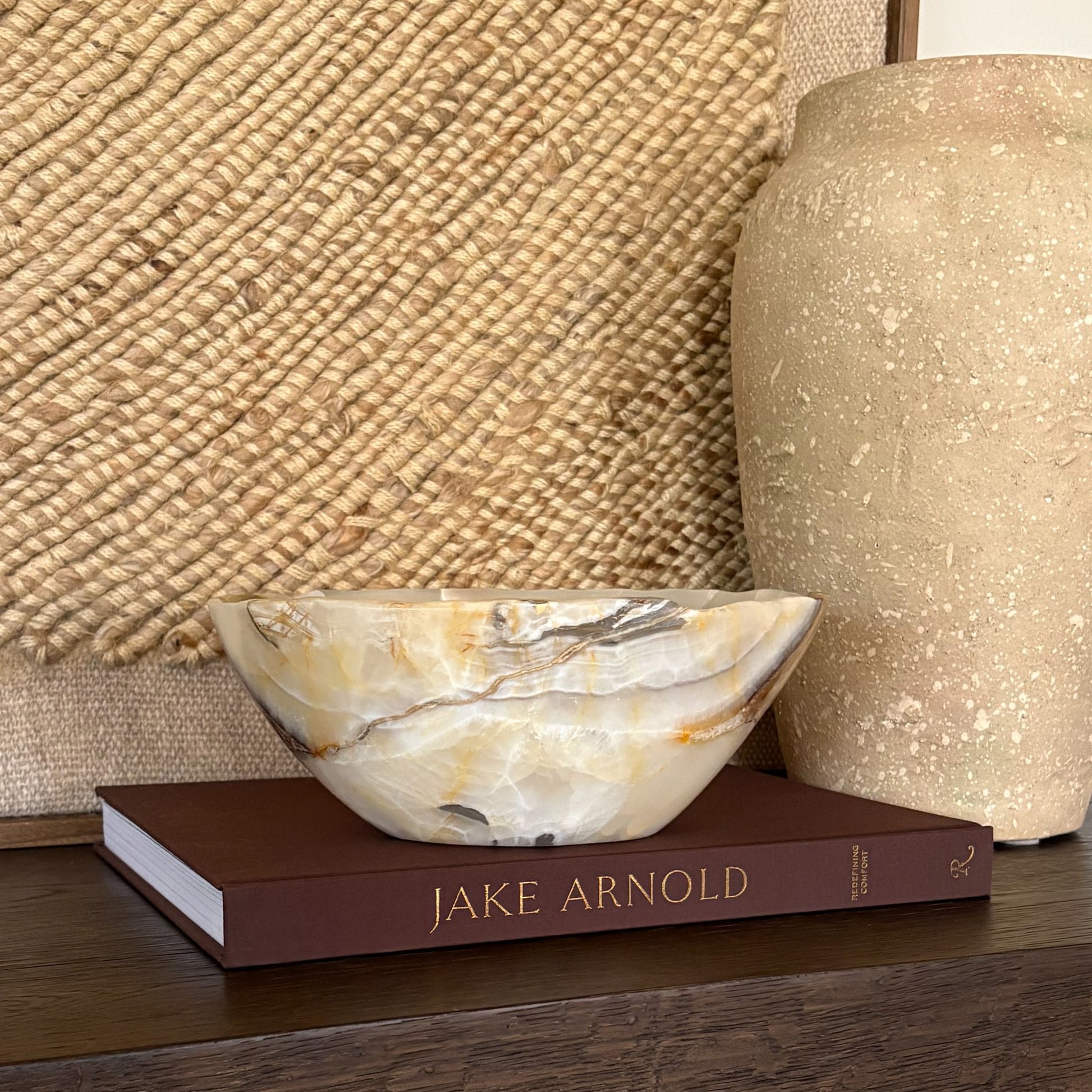 Artisan olive onyx bowl used as a decorative home accent