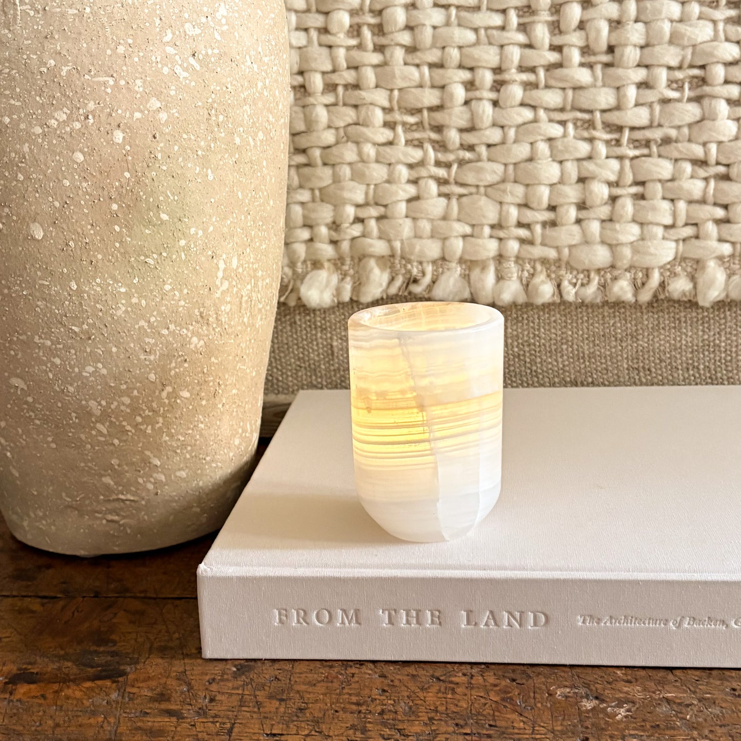 Hand-carved onyx cylinder candle holder