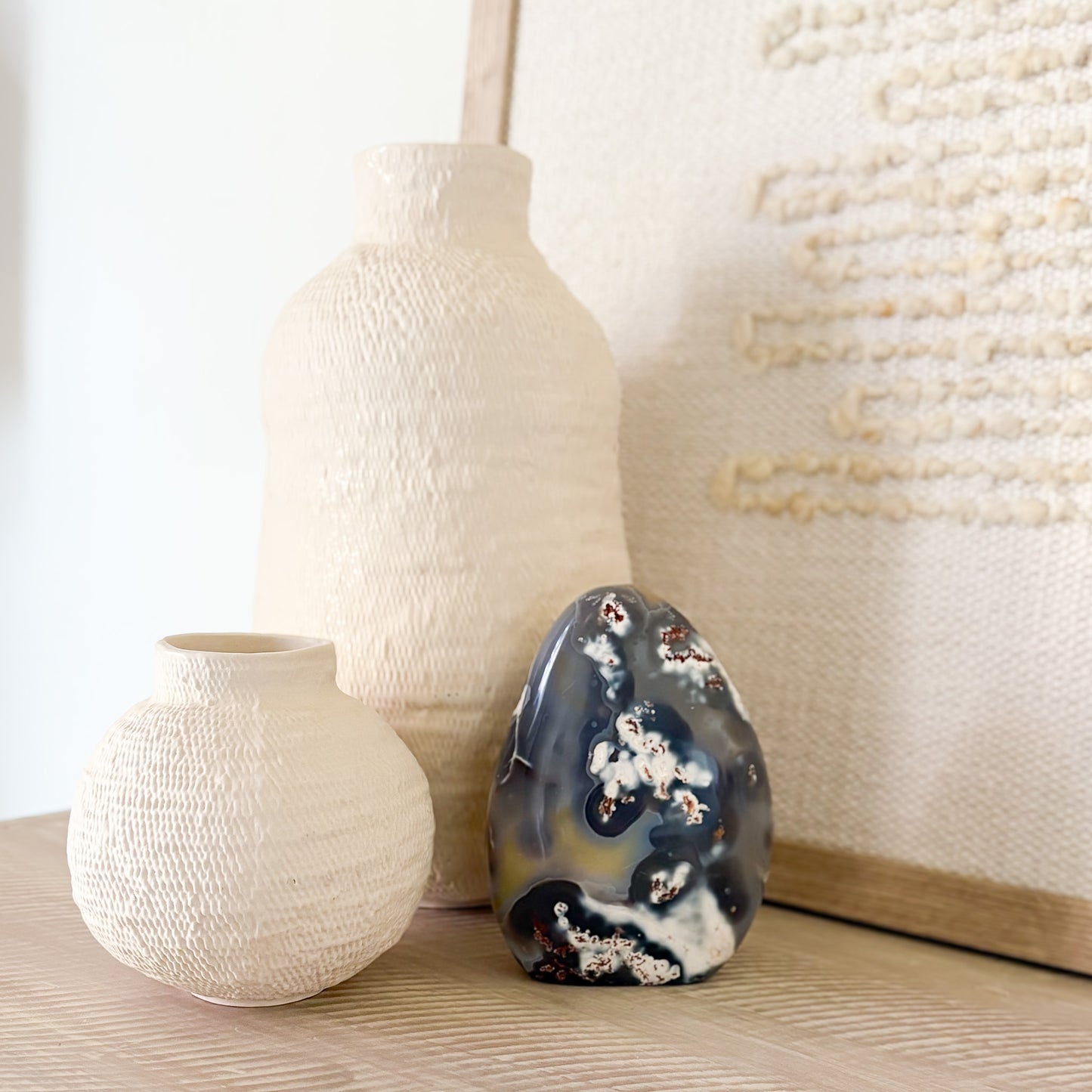 Orca agate sculpture displayed on modern living room shelf