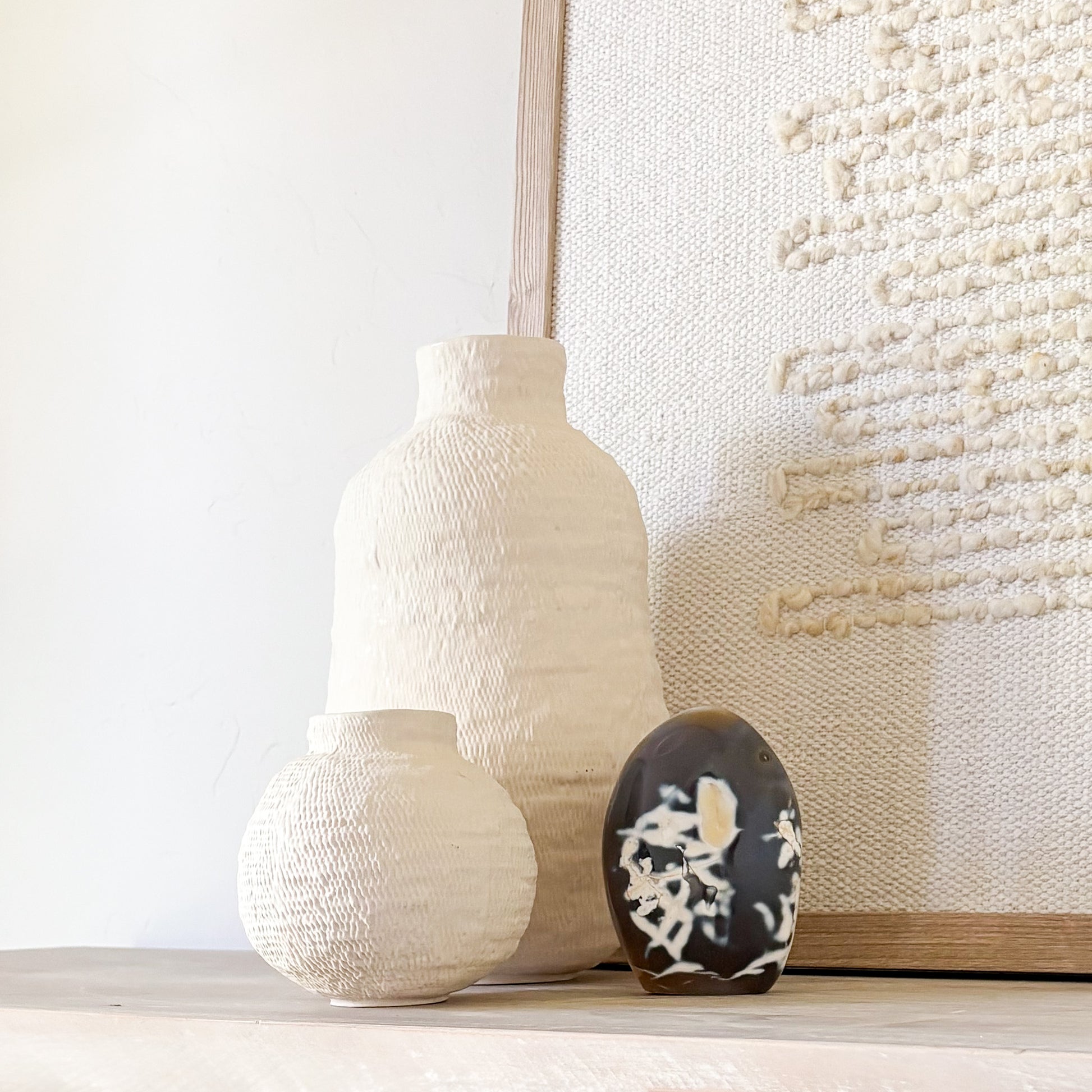 Artisan orca agate carving with striking whale-like patterns and smooth polished finish