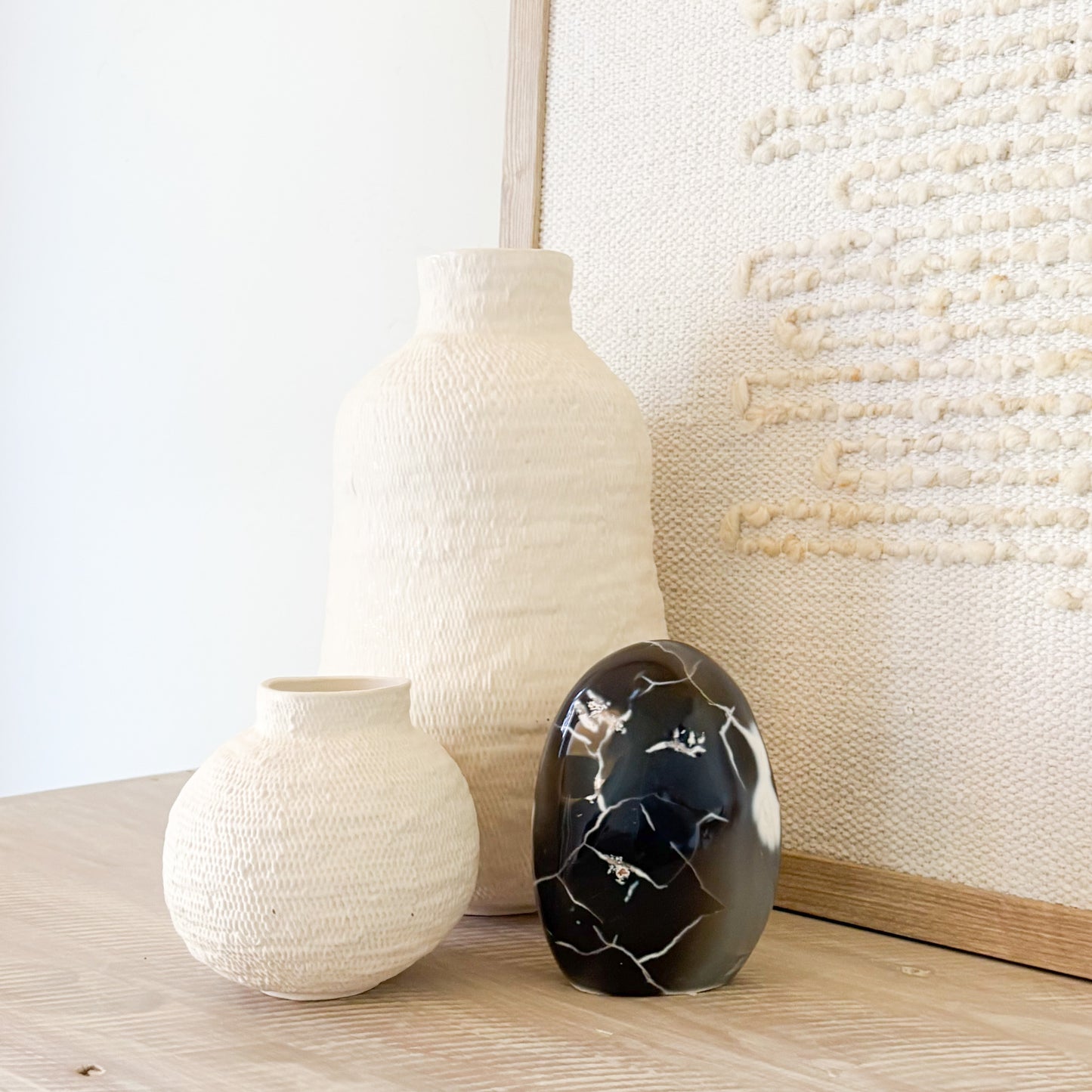 Hand-carved orca agate crystal sculpture with natural blue and white banding, decorative gemstone art
