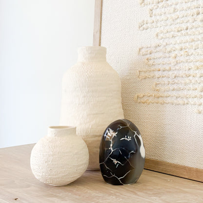Hand-carved orca agate crystal sculpture with natural blue and white banding, decorative gemstone art