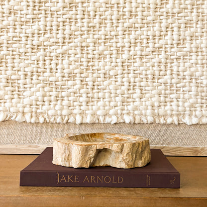 Indonesian fossil wood bowl with organic shape and natural stone texture