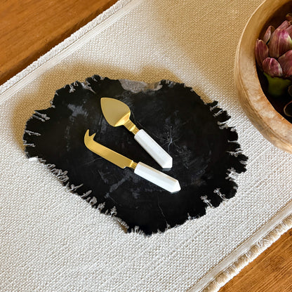 black petrified wood charcuterie board