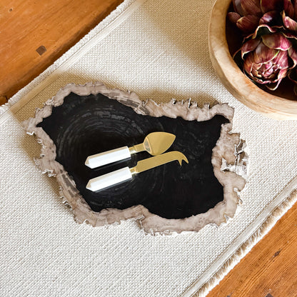 black petrified wood charcuterie board