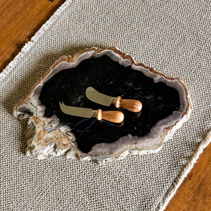 Authentic Indonesian petrified wood charcuterie board featuring unique mineral patterns