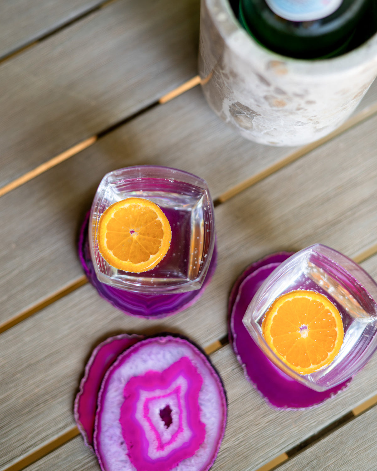 Bright pink fuchsia agate coasters with organic stone patterns