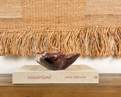 Pink serpentine decorative bowl with dramatic natural mineral veining