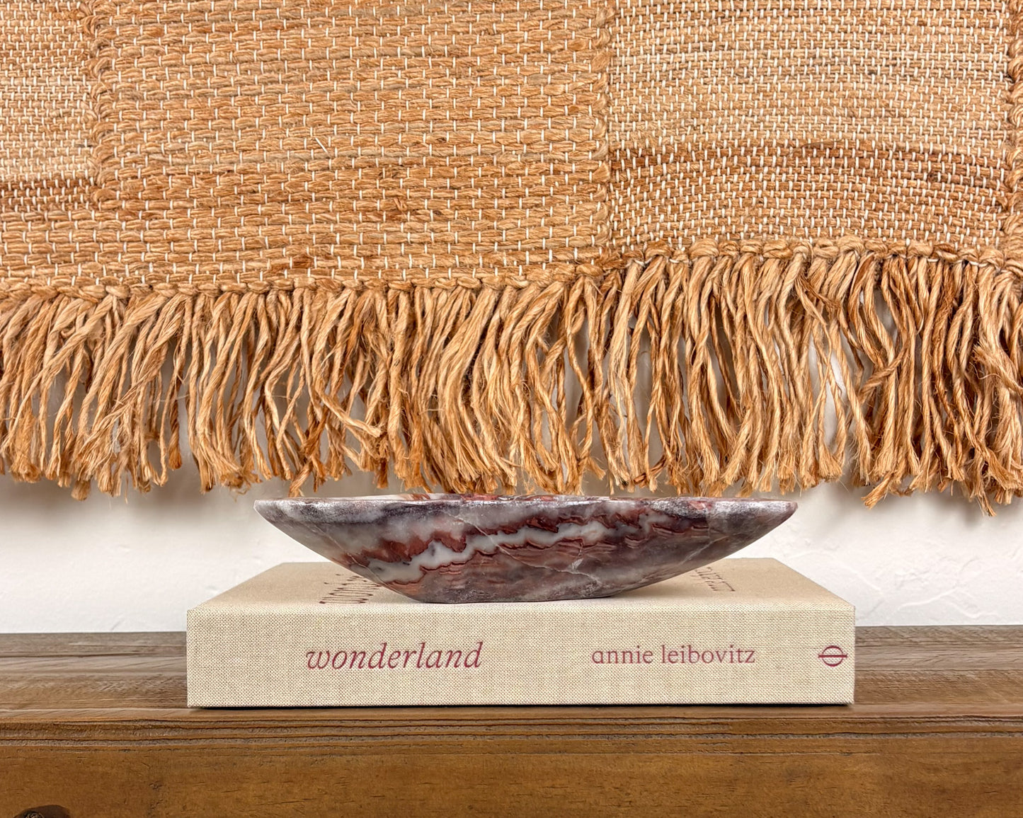 Pink serpentine decorative bowl with dramatic natural mineral veining