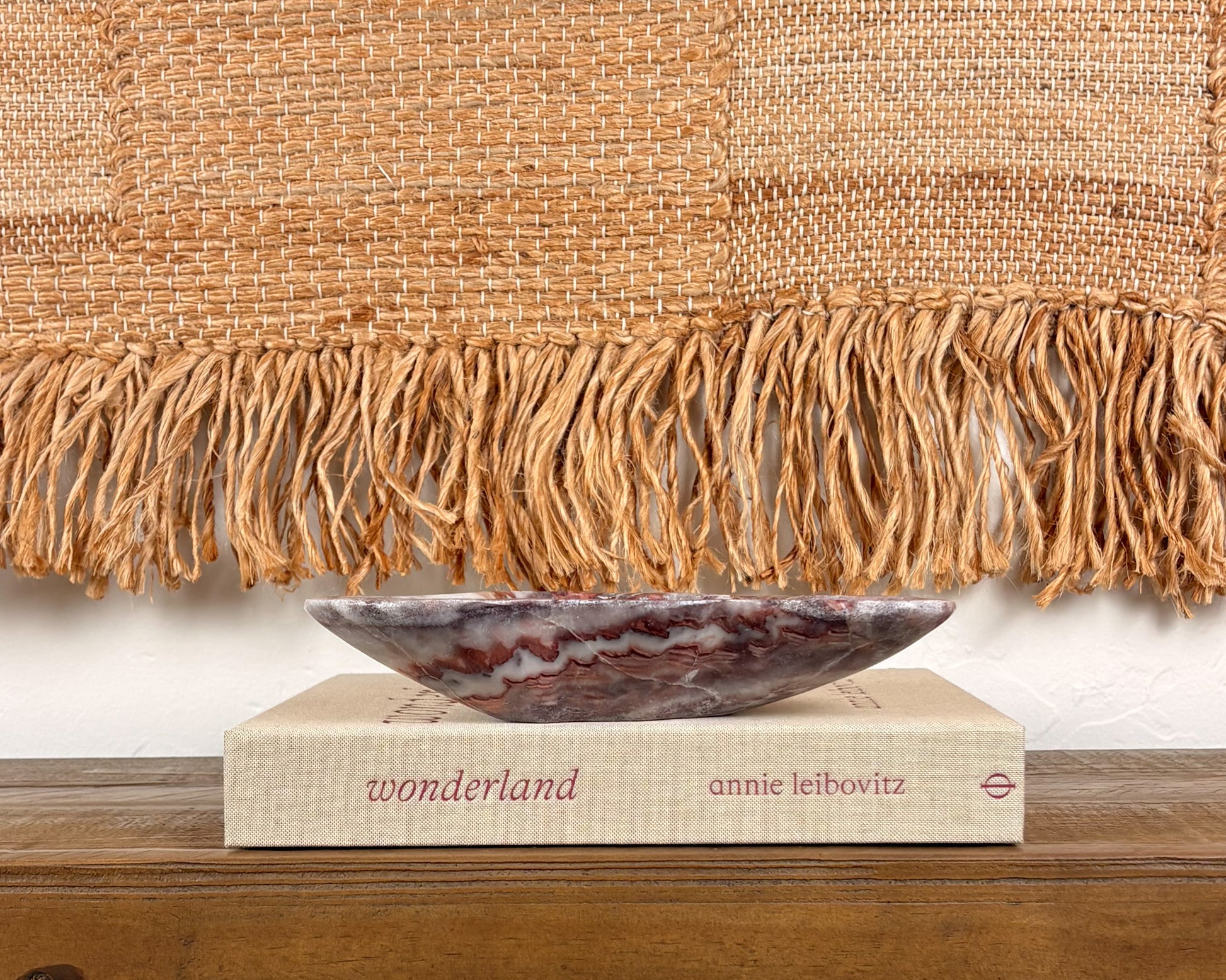 Pink serpentine decorative bowl with dramatic natural mineral veining