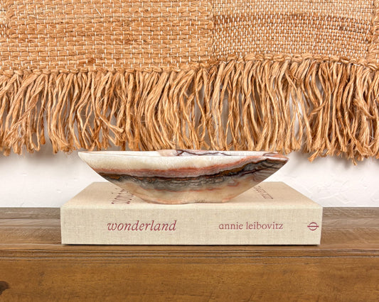 Pink serpentine decorative bowl with organic irregular form and natural veining