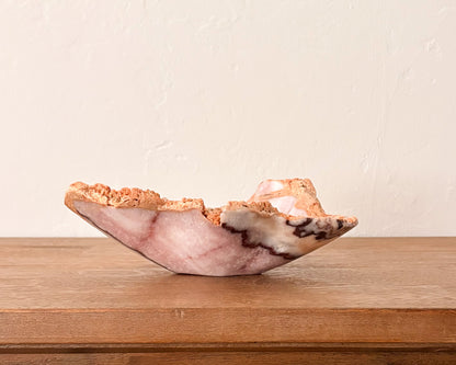 Hand-carved pink serpentine bowl with natural stone variation