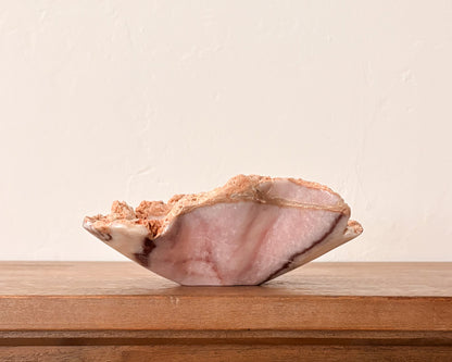 Pink serpentine stone bowl with natural veining