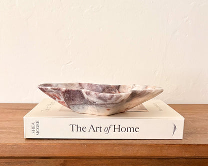 Pink serpentine bowl with cream and blush veining