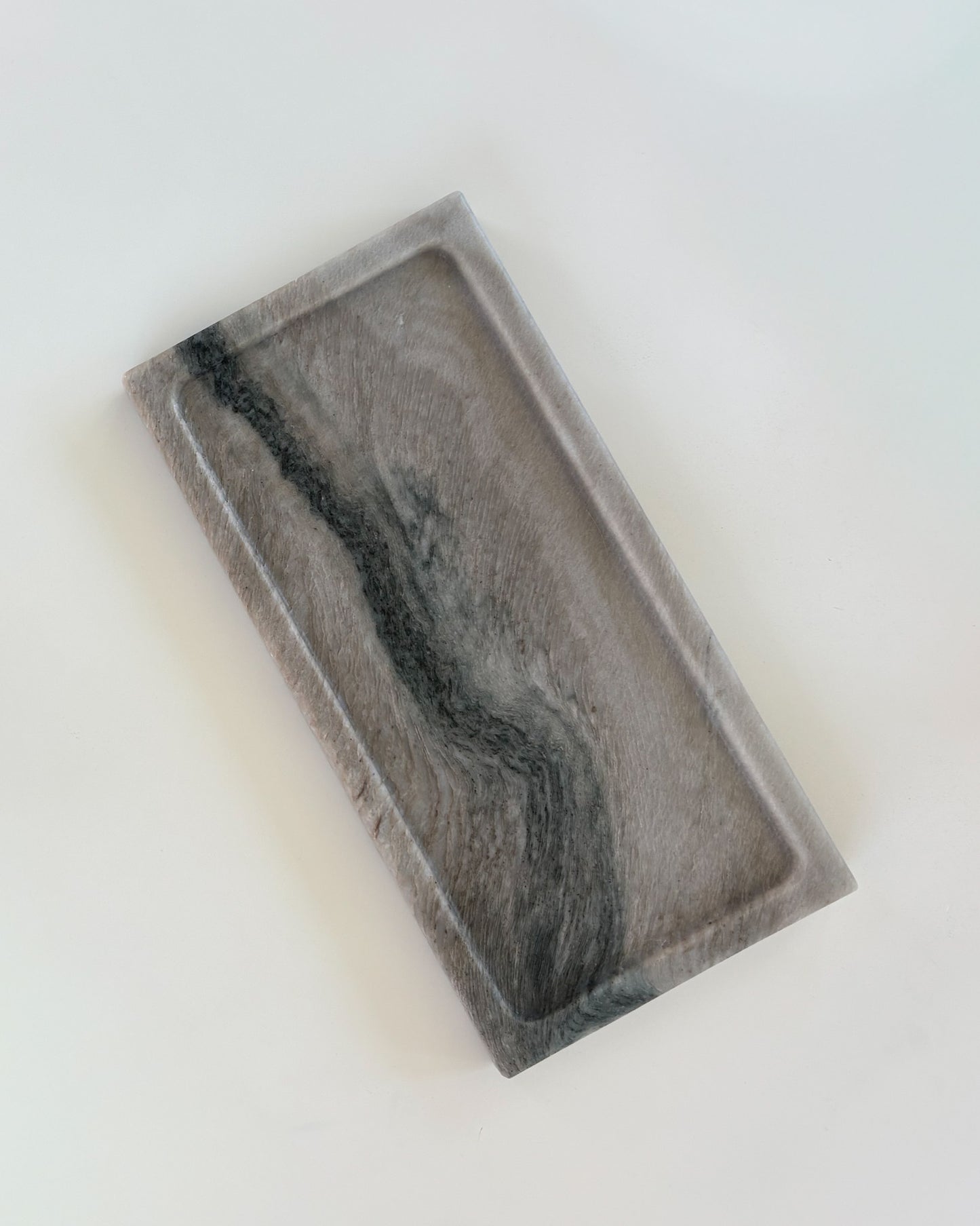 Luxury gray marble tray with distinctive natural veining for modern home décor