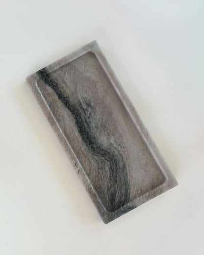 Luxury gray marble tray with distinctive natural veining for modern home décor