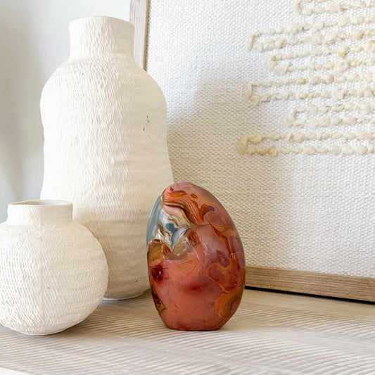 decorative red and blue madagascar jasper statue