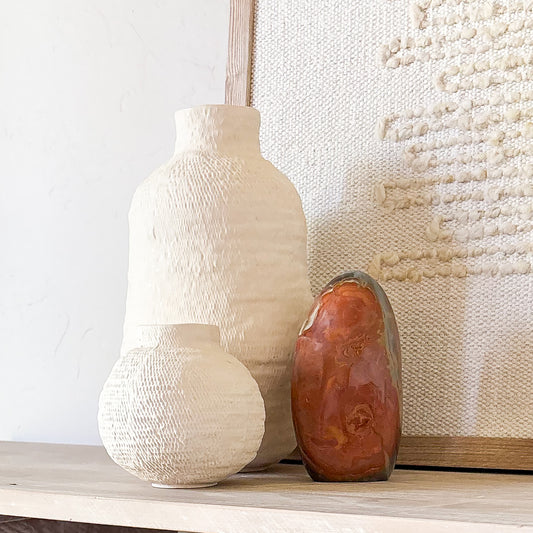 Polychrome jasper home accent in neutral toned living space