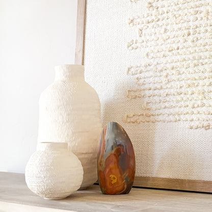 Handcrafted polychrome jasper stone sculpture with earthy tones for modern home decor