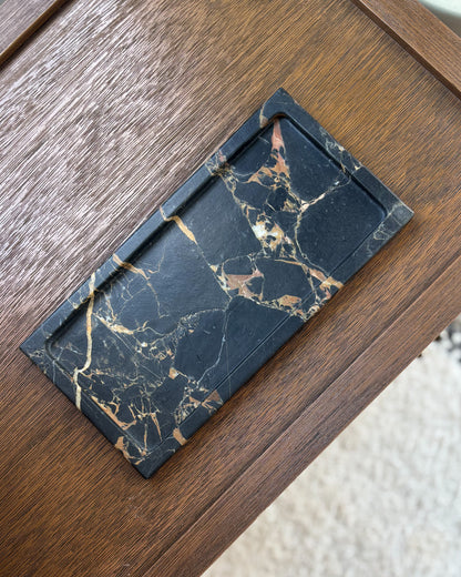 Elegant black marble tray with bold gold veining for home décor