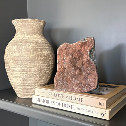 Natural amethyst geode displayed in modern home decor setting