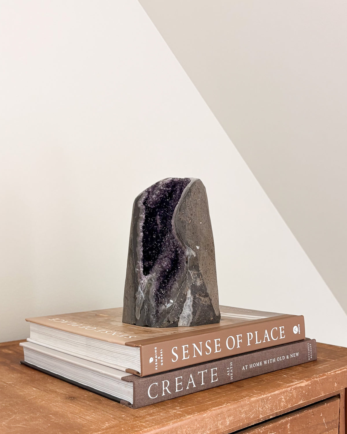 Purple rainbow amethyst geode with polished cut base