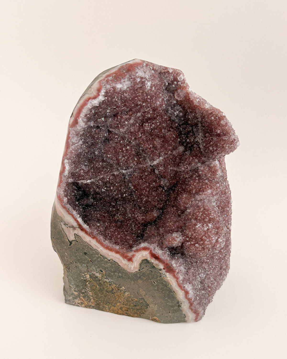 Freestanding amethyst crystal geode with delicate lavender and smoky purple tones