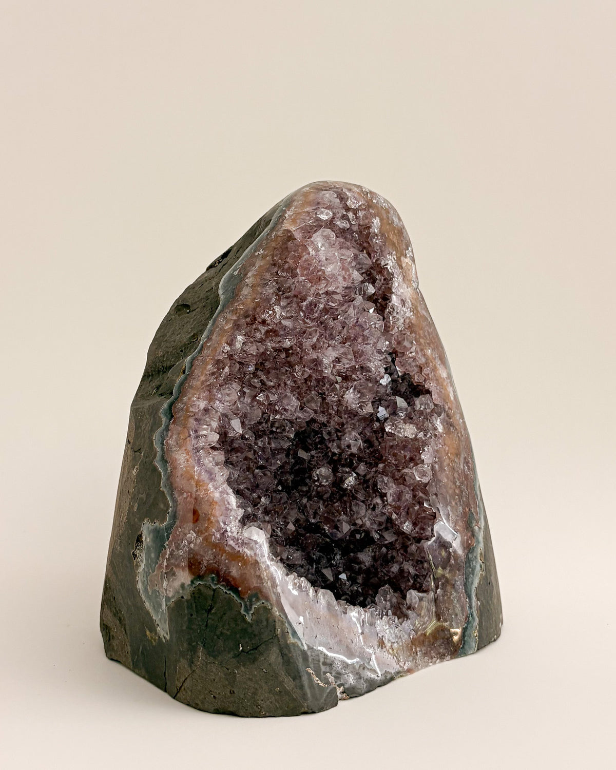 Freestanding amethyst crystal geode with delicate lavender and smoky purple tones