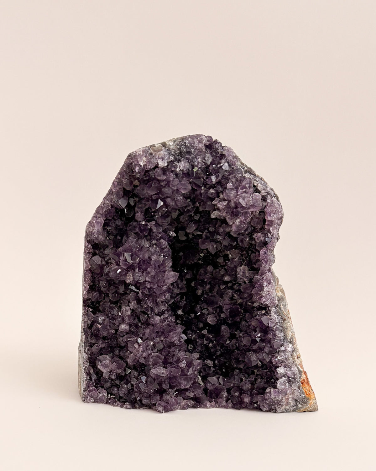 One-of-a-kind amethyst geode featuring fine druzy crystals and earthy mineral tones
