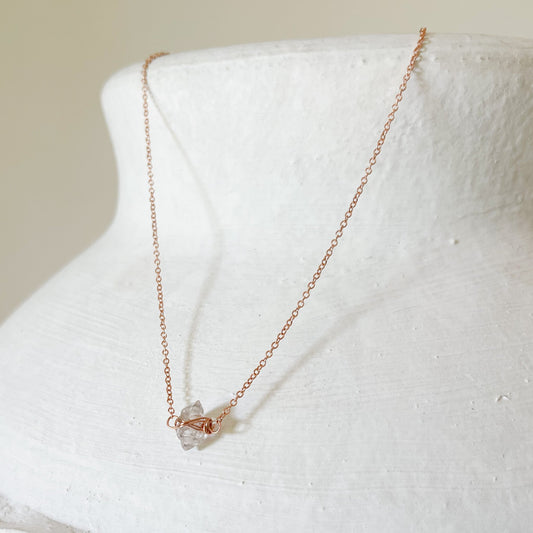 Rose gold Herkimer diamond caged necklace