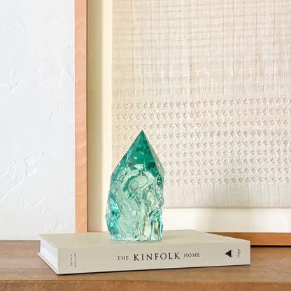 Coastal inspired aqua glass decor accent with natural textures