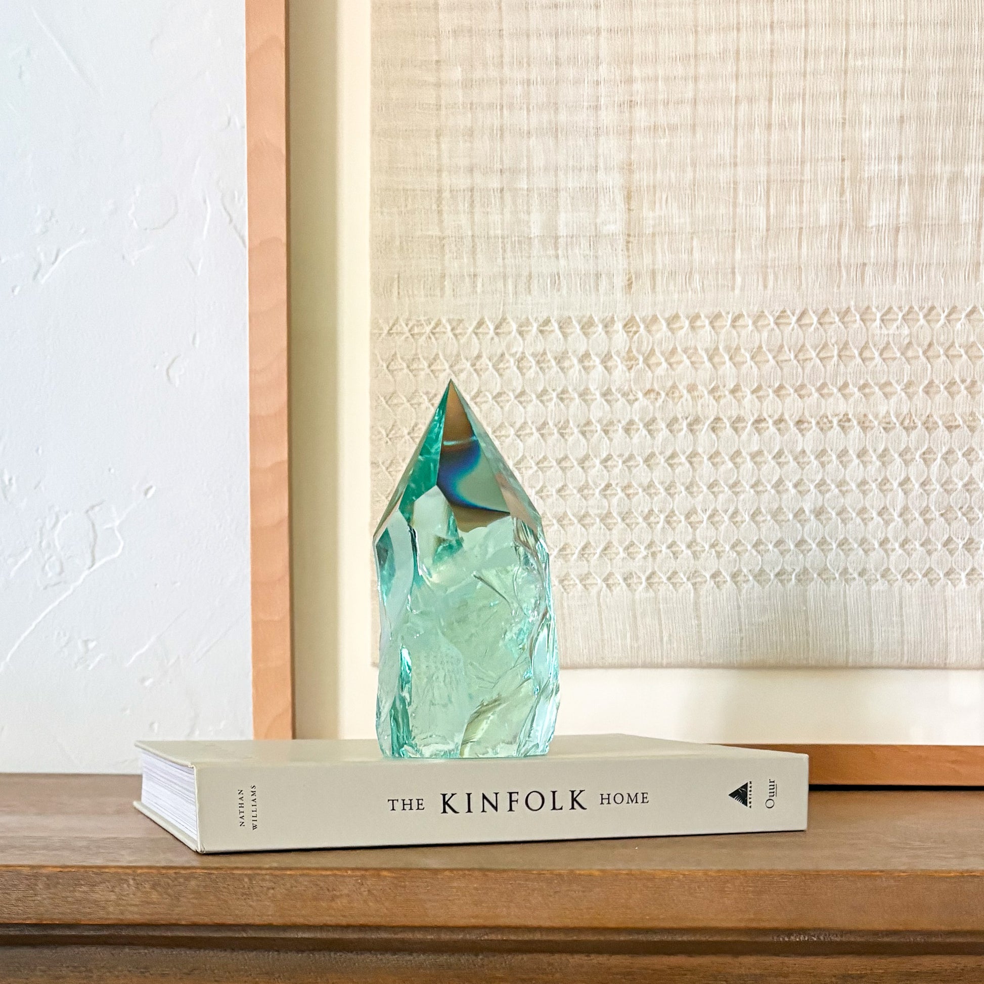Aqua glass crystal decor accent on book stack