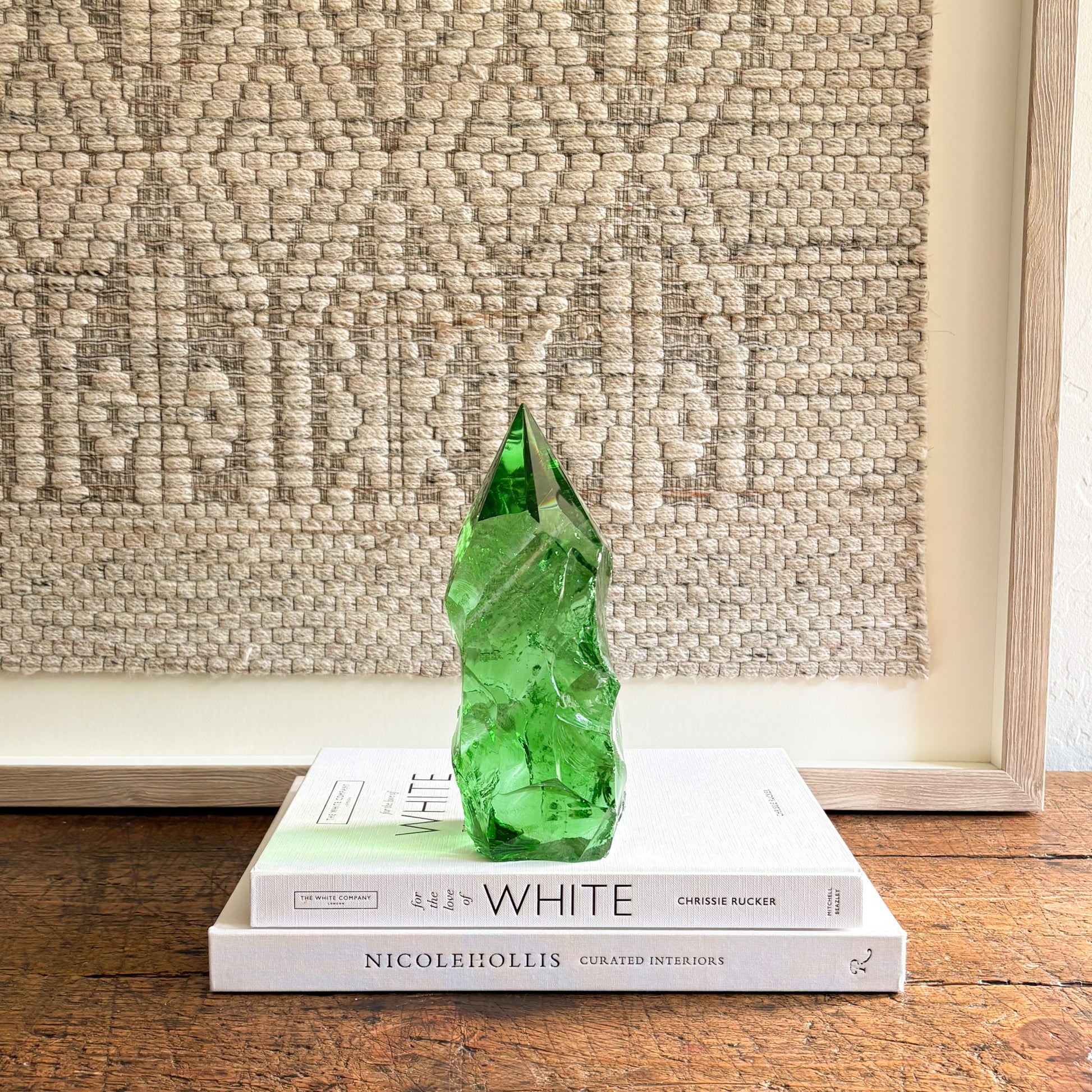 Emerald green glass crystal point, rustic faceted design for altar decor, shelf styling, or crystal collections