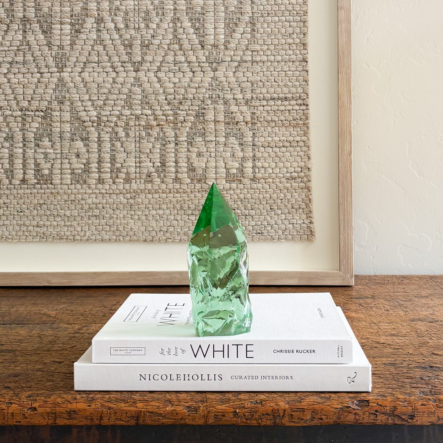 Artisan green glass point styled in neutral interior