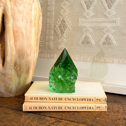 Green glass point crystal decor with carved wood vase and neutral wall hanging