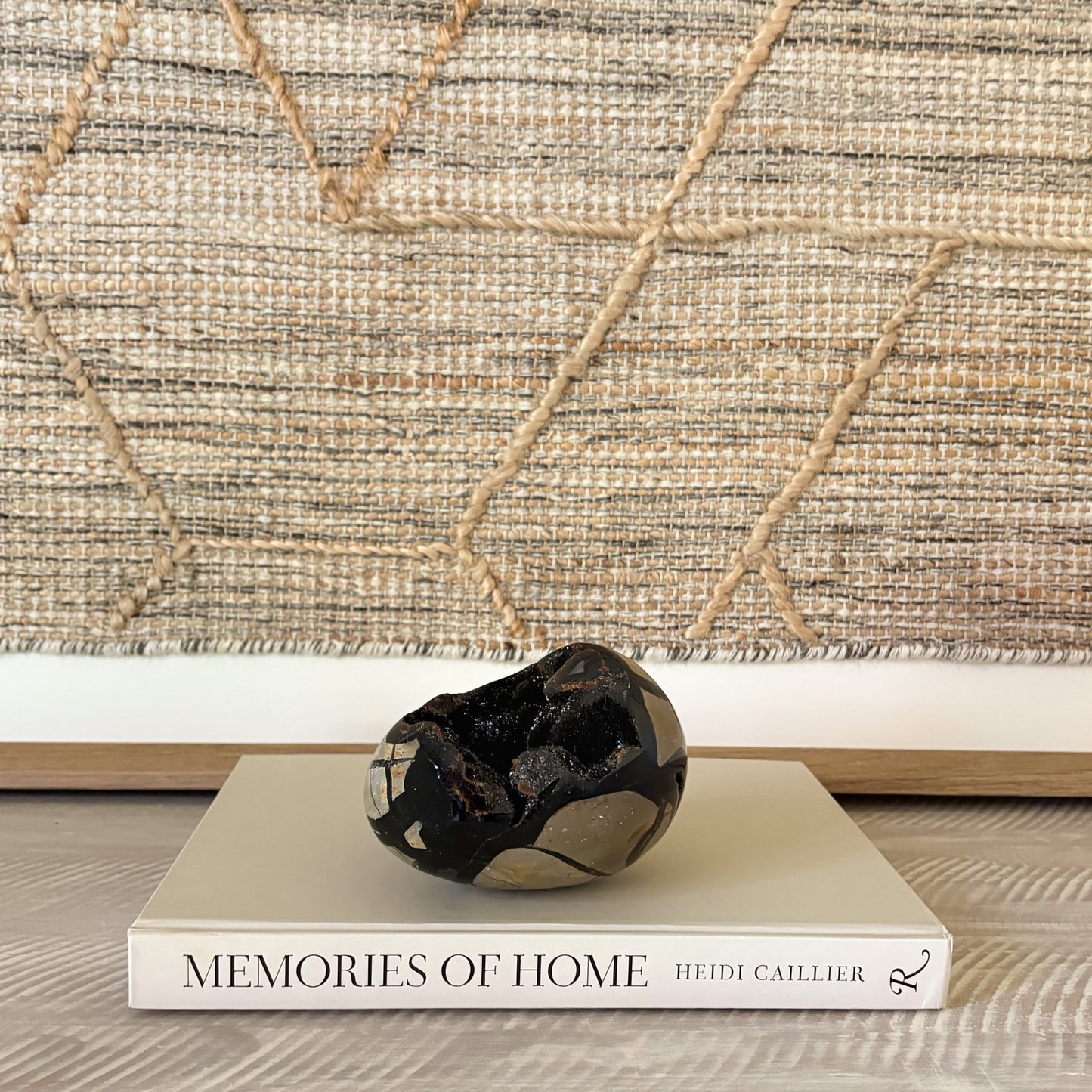 Septarian druzy egg on a shelf as earthy crystal home decor