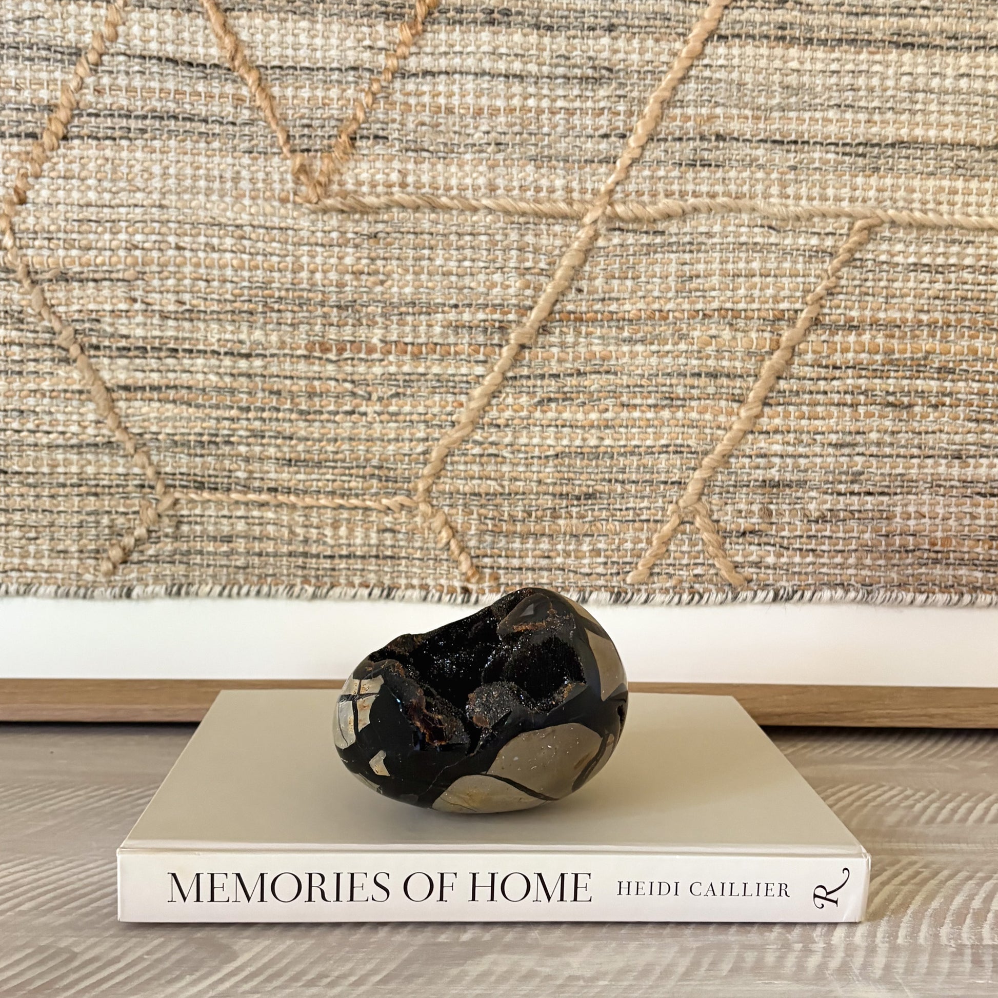 Septarian druzy egg on a shelf as earthy crystal home decor
