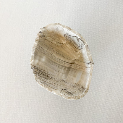 Minimalist hand-carved stone bowl made from grey onyx