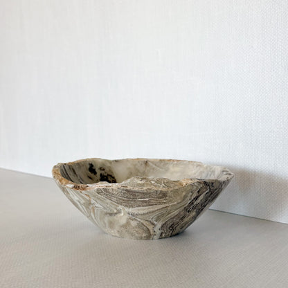 Small hand-carved grey onyx bowl with natural stone veining