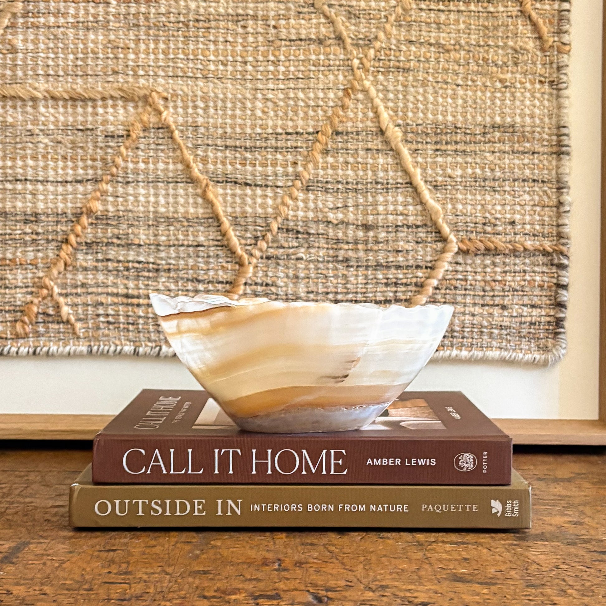 Small hand-carved amber onyx bowl with warm golden tones