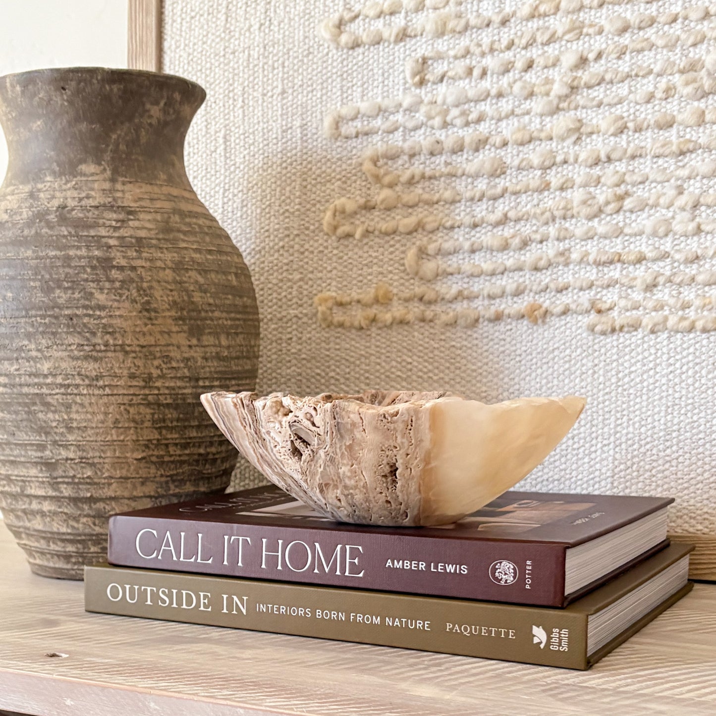 Small hand-carved amber onyx bowl made from natural stone, polished finish