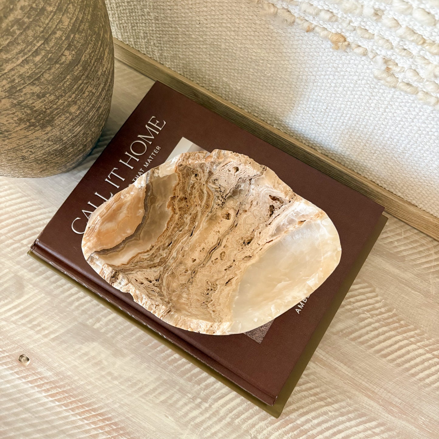 Artisan small hand-carved amber onyx bowl crafted from natural semi-precious stone