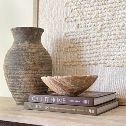 Artisan small hand-carved amber onyx bowl crafted from natural semi-precious stone