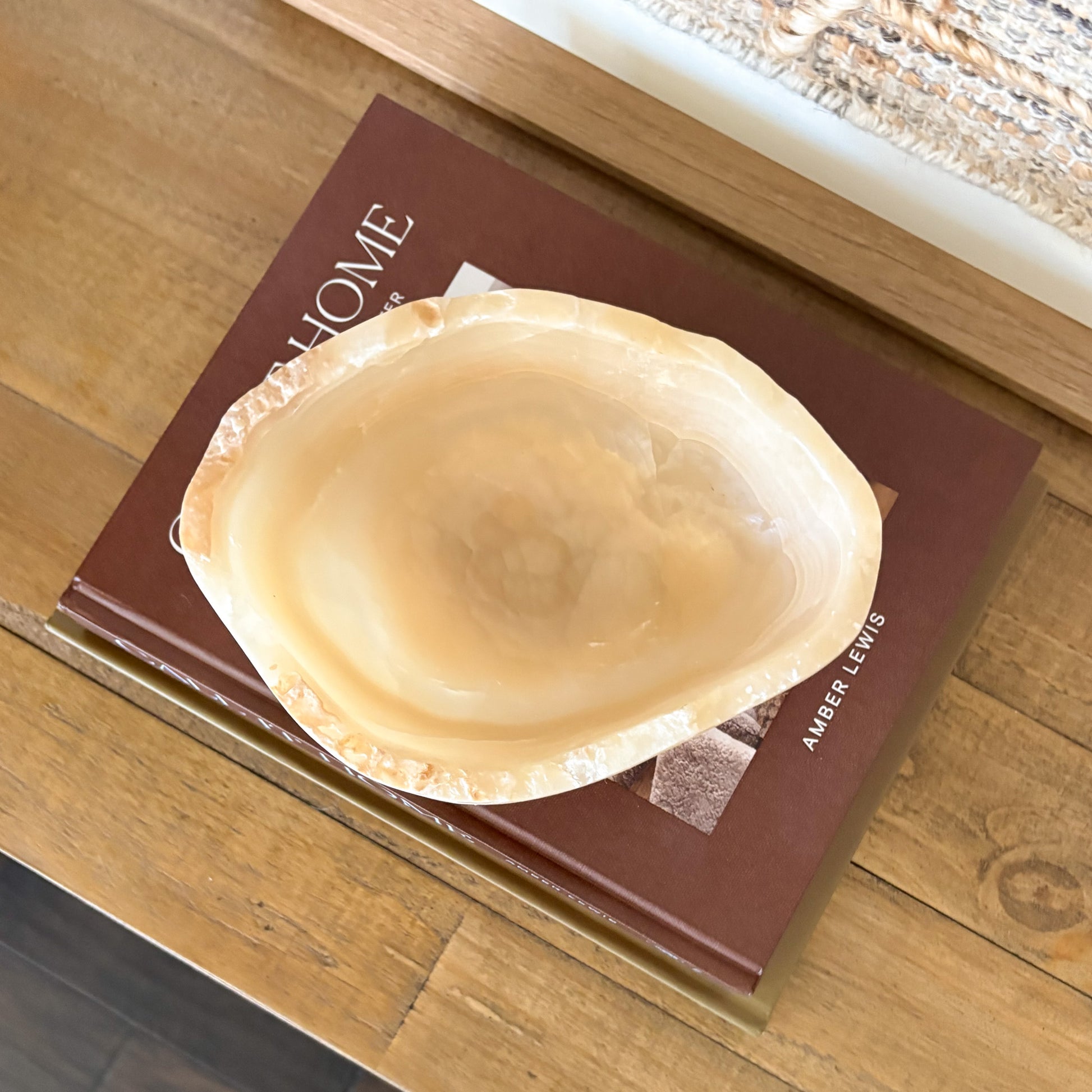 Artisan carved amber onyx bowl in neutral stone tones