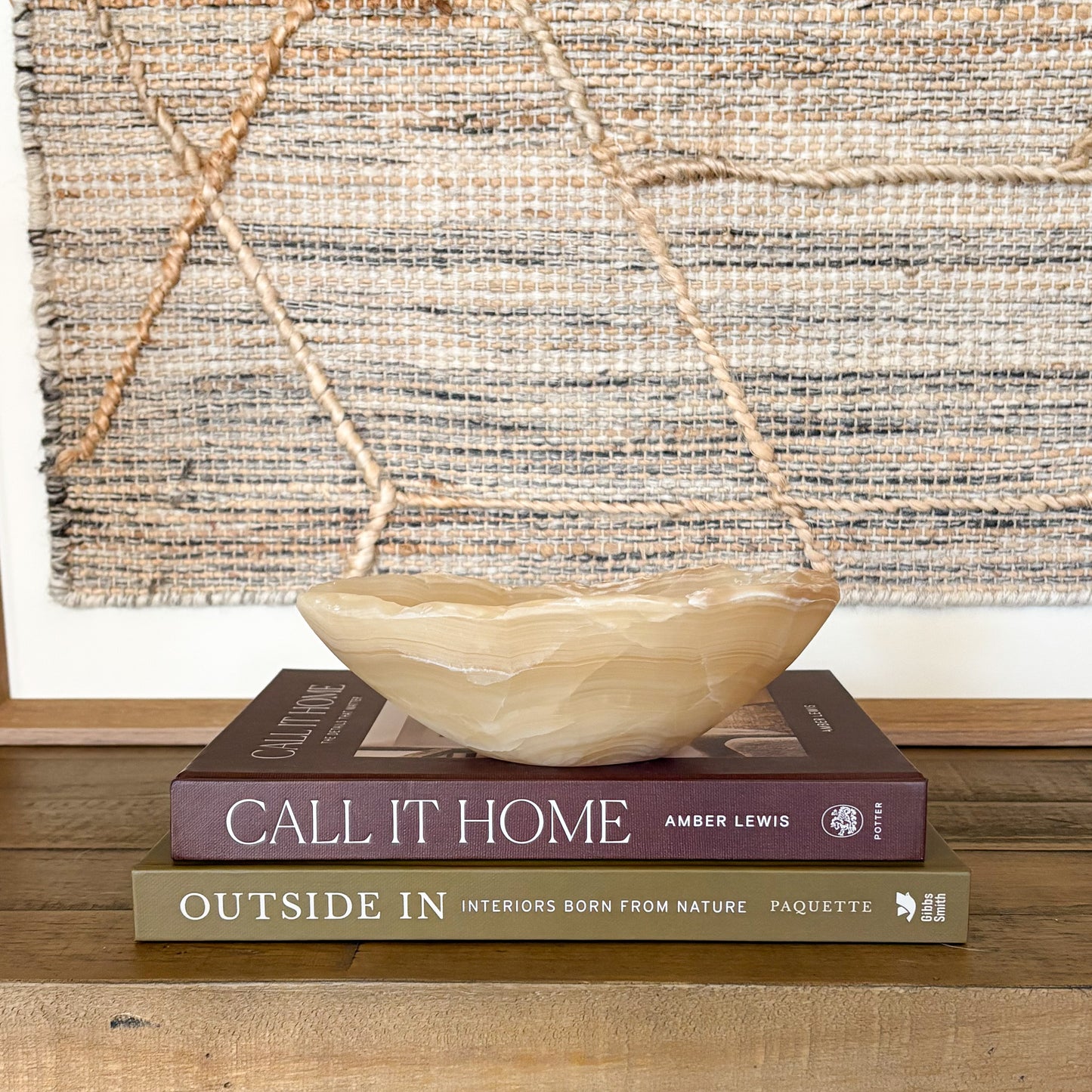 Hand carved amber onyx bowl used as minimalist home decor accent