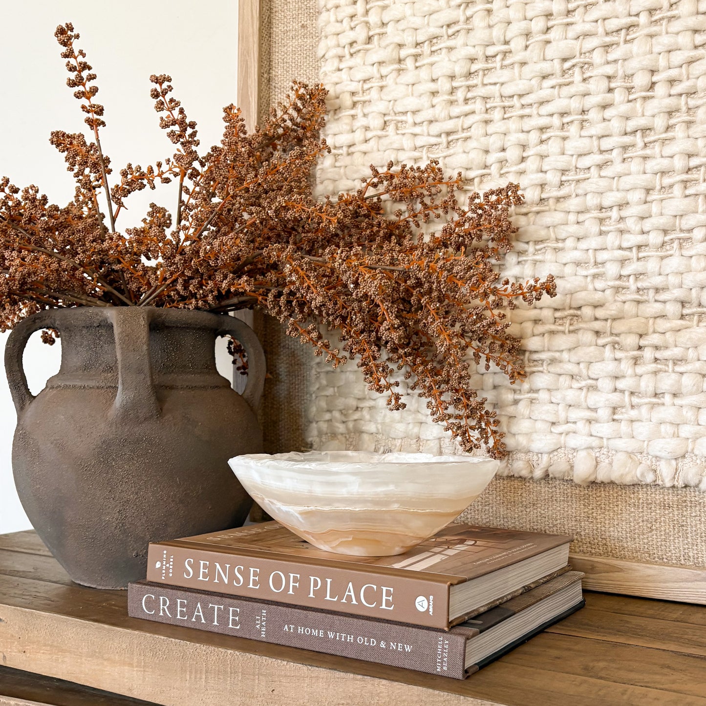 Small amber onyx bowl hand carved from natural stone, decorative tabletop accent