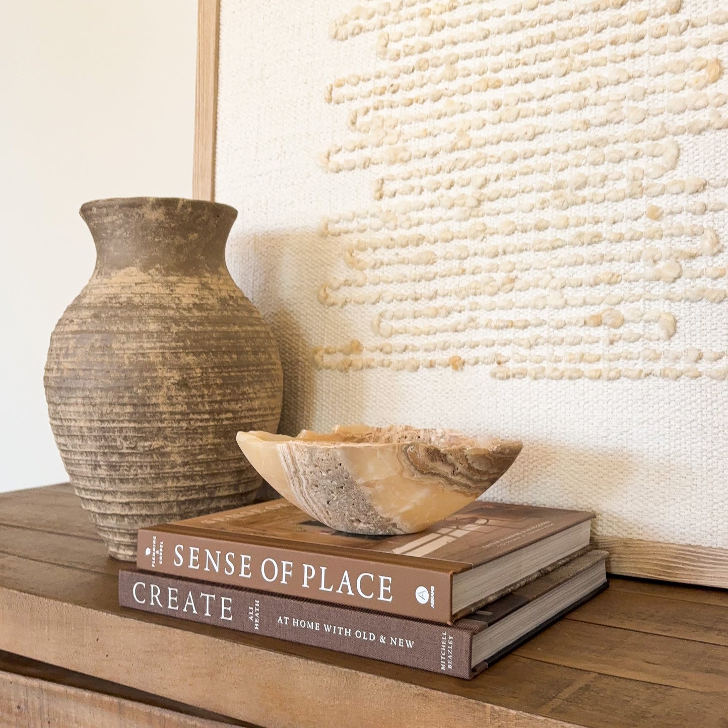 Genuine amber onyx crystal bowl with layered earth tone patterns