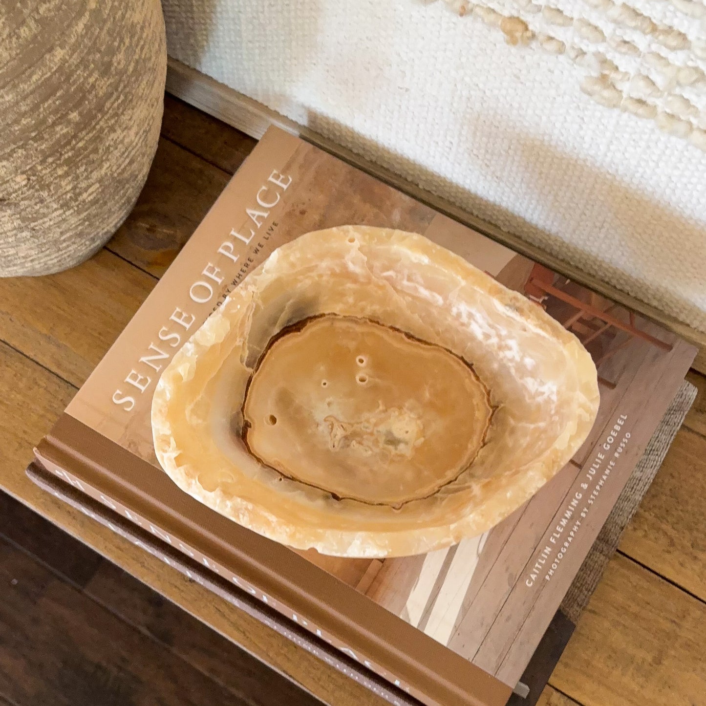 Small decorative amber onyx bowl carved from genuine banded onyx