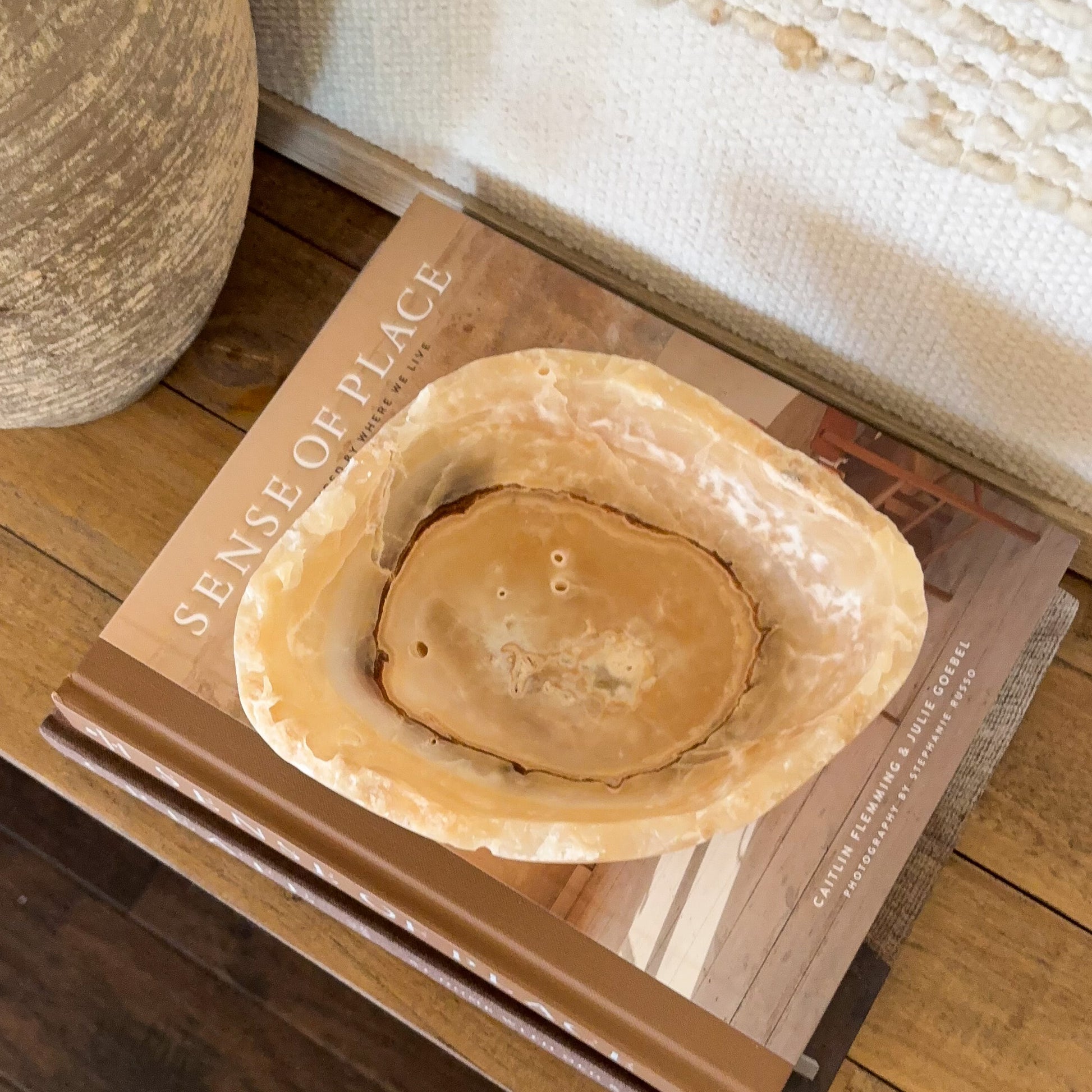 Small decorative amber onyx bowl carved from genuine banded onyx